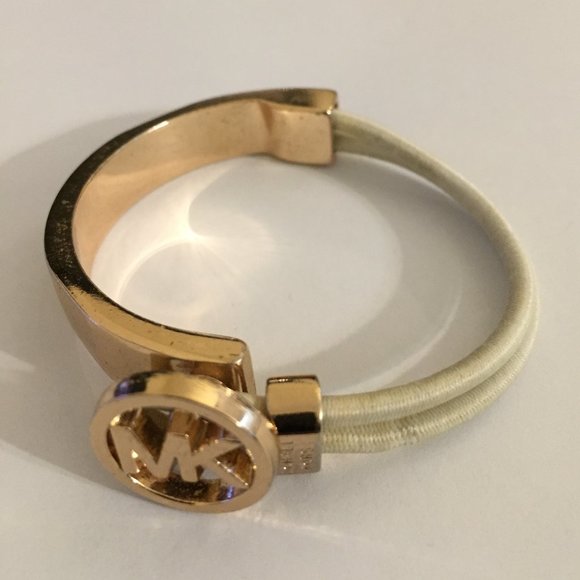 Michael Kors Stretch Bracelet with MK symbol. Gold tone and black cord. No blemi - Picture 1 of 3